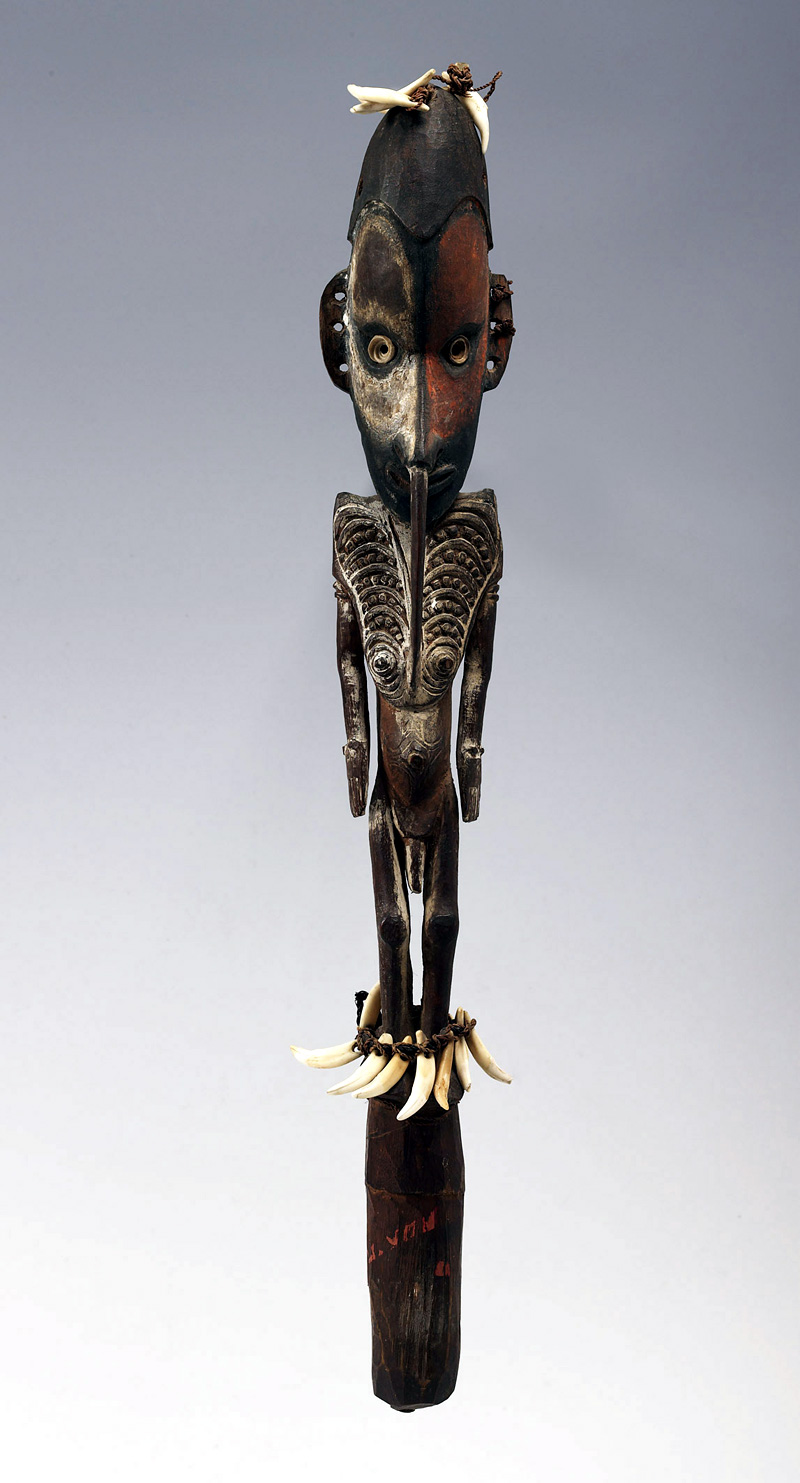 Flute Figure; Papua New Guinea, East Sepik Province, Chambri; Polychrome wood and dog's teeth; Height: 50 cm